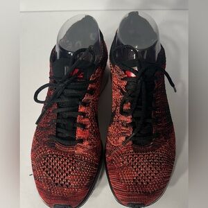 Nike women Red and Black Running Shoes size 6.5 pre owned Exellent condittion.